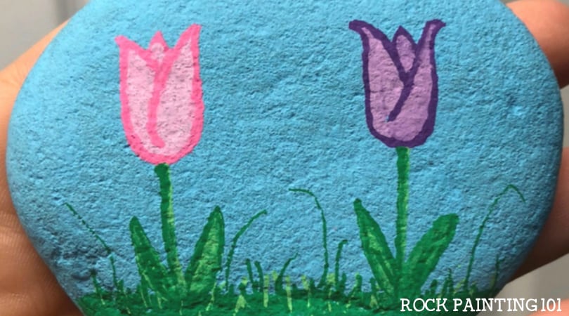 How to make tulip painted rocks. Perfect for spring.