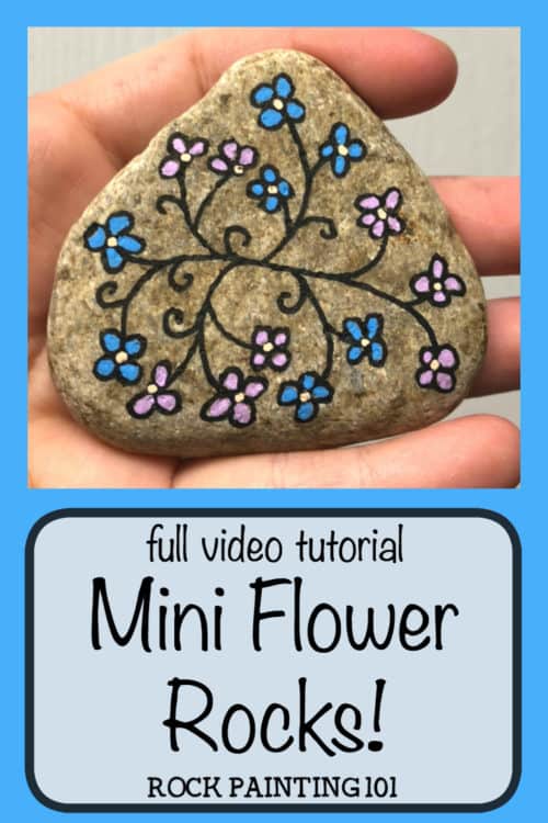 These flower vine rocks are a simple flower painting idea that is perfect for the beginner rock painter. #flowervinerock #miniflowerrocks #simpleflowerpainting #paintingflowersonrocks #stonepaintingflowerpebbleart #howtopaintrocks #poscapaintpens #rockpaintingforbeginners #rockpaintingspring #rockpainting101