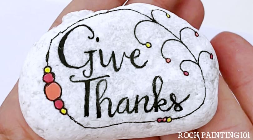 How to easily make hand lettered Thanksgiving rocks