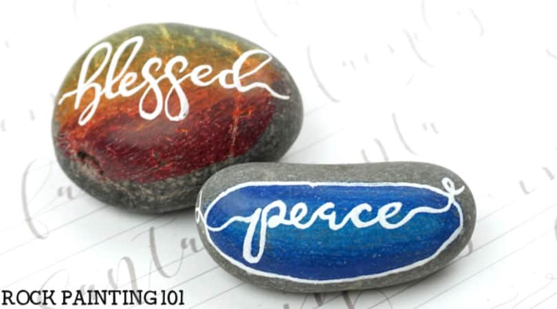 Tips for hand lettering a single word onto a painted rock