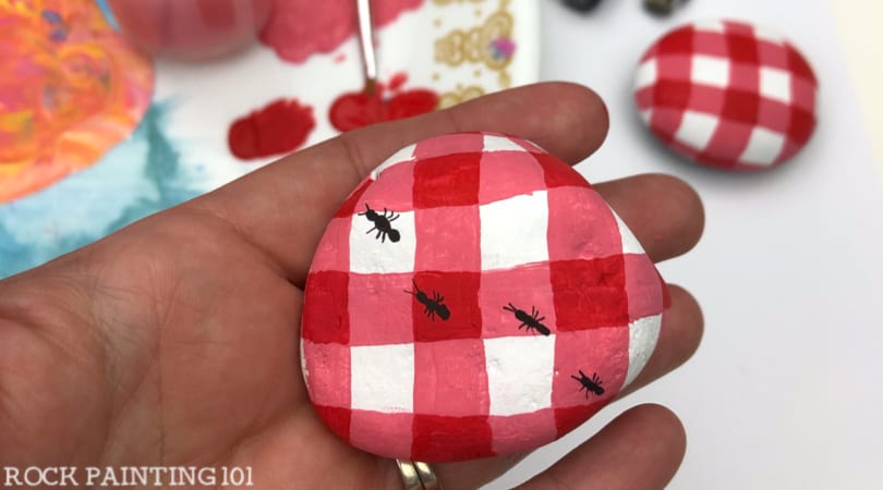 How to paint a red and white checkered pattern onto a rock